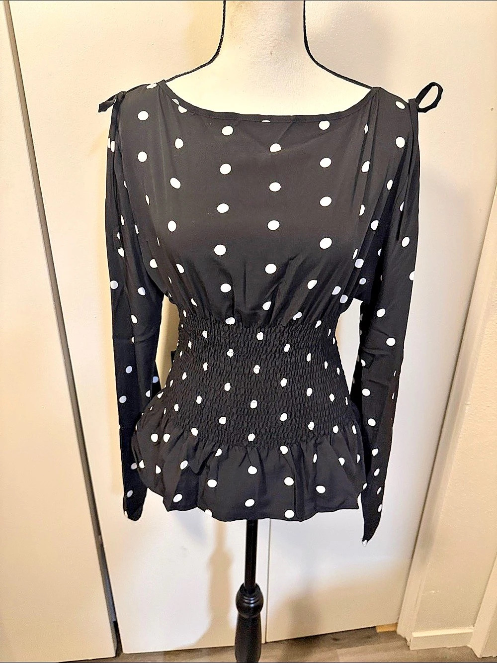 Polka Dot Smocked Peplum Blouse in Black & White